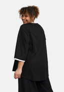 Blusa 'Saria' – asimmetrica, leggera e naturale